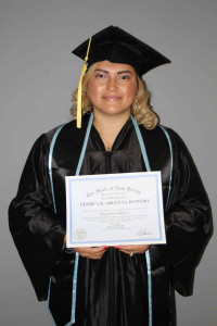 woman blond hair holding a high school diploma